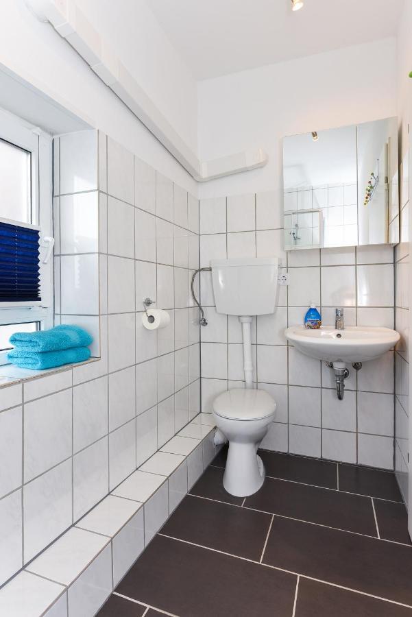 Ferienwohnungen Im Haus Waterkant Neuharlingersiel Eksteriør billede